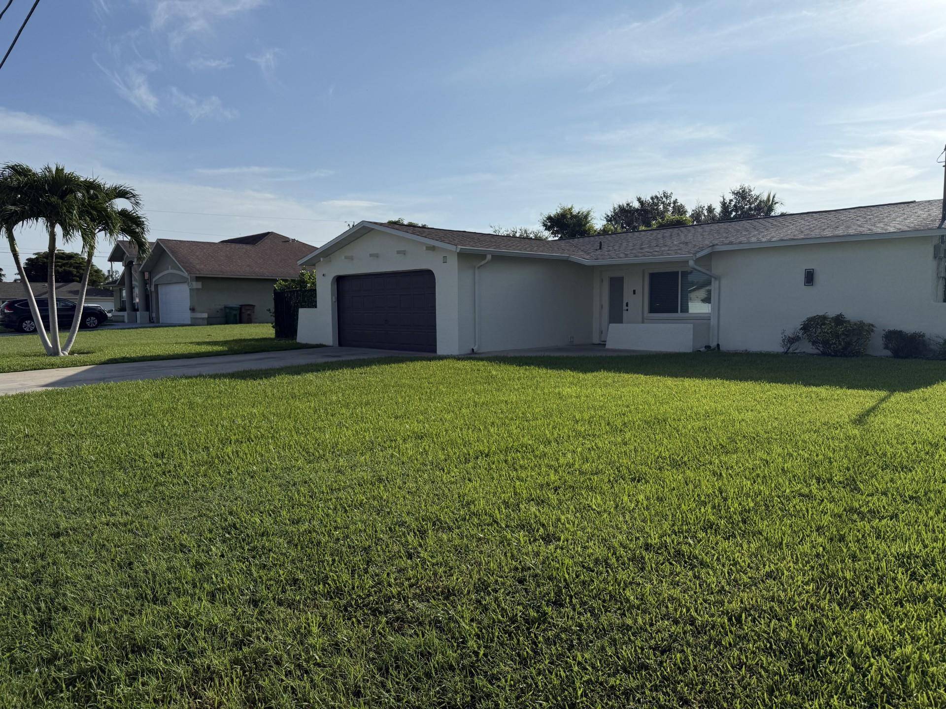 Immaculate 3-bed, 2-bath home with 2-car garage, new roof, impact windows/doors, and modern tile throughout. Located at the end of a freshwater canal with stunning long water views and potential for a private boat dock. Eastern-facing backyard offers beautiful sunrises, plus a large screened lanai perfect for relaxing. Fully fenced yard with room for a pool. Bright, open layout and spacious owner’s suite. Conveniently located just minutes from Publix, Walmart, Cape Coral Hospital, Crunch Fitness, and great dining. A true move-in ready gem with access to boating and Florida living at its best!