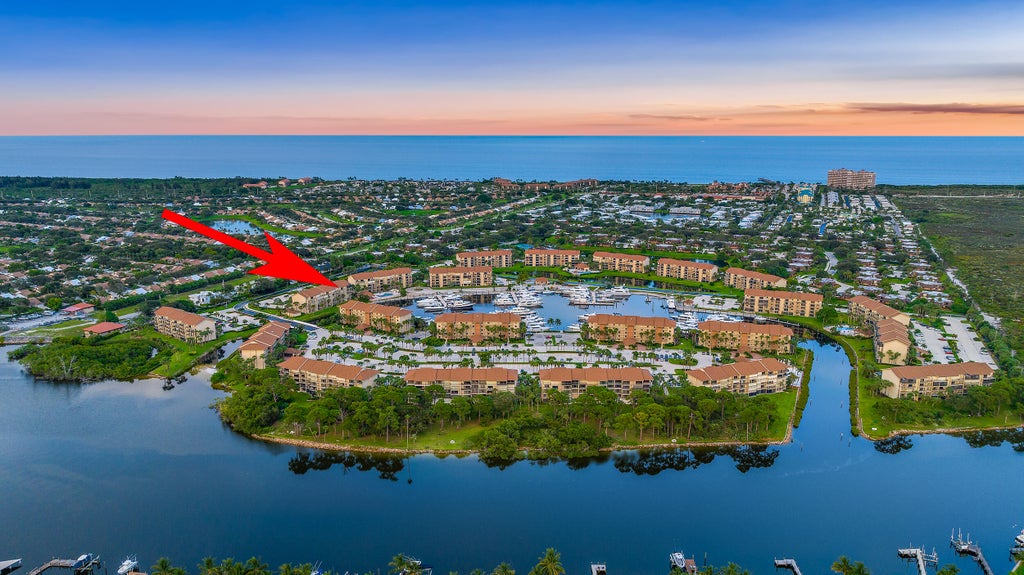 Photo of 1601 Marina Isle Way #202, Jupiter, FL 33477 (MLS # R10916469)