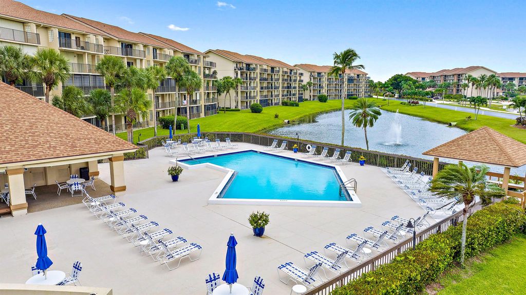 Photo of 1601 Marina Isle Way #202, Jupiter, FL 33477 (MLS # R10916469)