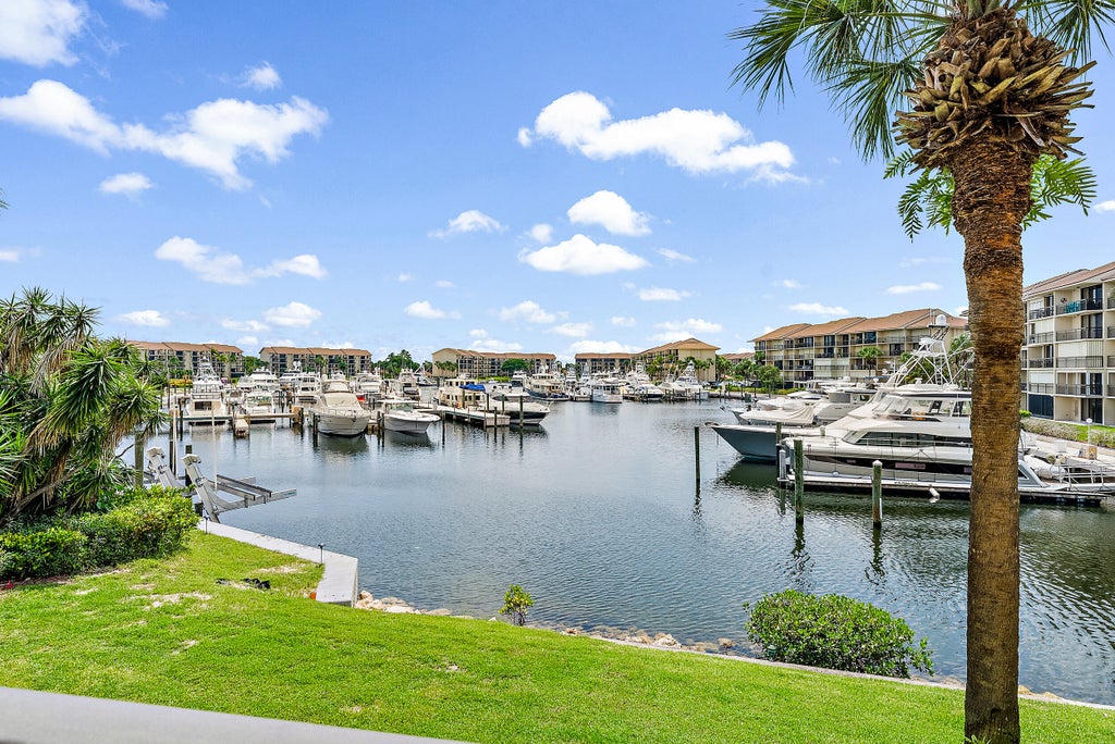 Photo of 1601 Marina Isle Way #202, Jupiter, FL 33477 (MLS # R10916469)