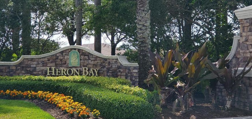 FABULOUS GUARD GATED HERON BAY! OUTSTANDING 1ST FLOOR LOCATION WITH BEAUTIFUL LAKE VIEWS. PRIVATE GARAGE, VILLA STYLE, WITH LOVELY SCREENED PATIO. 3 BEDROOM 2 BATH SPLIT FLOOR PLAN. OPEN GREAT ROOM WITH ISLAND KITCHEN, GRANITE COUNTERS, WOOD CABINETS, STAINLESS APPLIANCES. LARGE LIVING AND DINING AREAS, WITH ACCESS TO YOUR SCREENED PATIO. PRIMARY BEDROOM HAS 2 CLOSETS & LARGE PRIVATE BATH.  ALL LARGE TILE IN LIVING AREAS AND PLANK STYLE FLOORS IN BEDROOMS ( NO CARPET ) SEP. LAUNDRY ROOM WITH WASHER AND DRYER. COME ENJOY ALL THE AMENITIES OF HERON BAY, CLUBHOUSE, FITNESS CENTER, POOLS, TENNIS, PLAYGROUNDS, SPLASH PAD & MORE. DEPOSIT BY TENANT REQUIRED TO HERON BAY CLUB,  CALL FOR ALL DETAILS AND TO SET AN APPOINTMENT, THIS BEAUTY WILL NOT LAST.