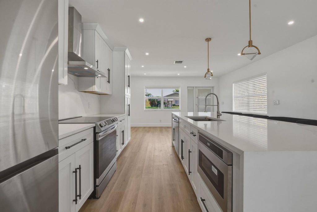 Photo of 461 SW 1st Street #461, Boca Raton, FL 33432 (MLS # B26018116)