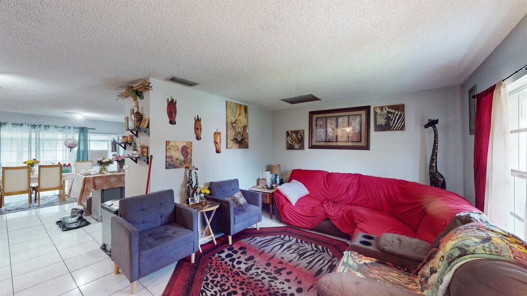 Photo of 216 SE Fallon Drive, Port Saint Lucie, FL 34983 (MLS # R11013893)