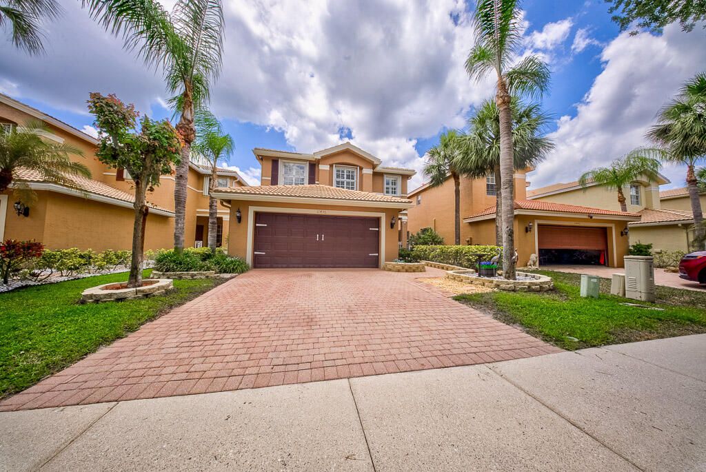 Photo of 11436 Blue Violet Lane, Royal Palm Beach, FL 33411 (MLS # B26044604)