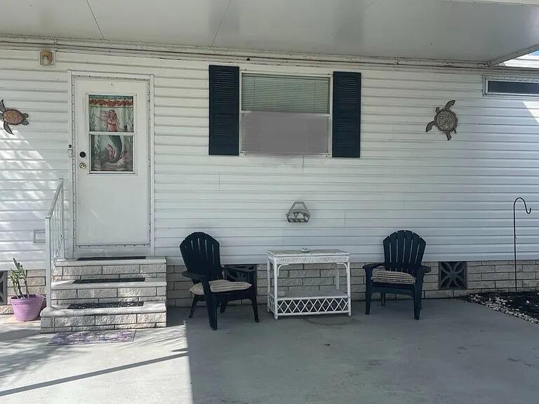 This home sits on a quiet street in Pinelake Gardens and Estates, a 55+ Community located 5 miles from Hobe Sound Beach. Amenities include two clubhouses, each offering a pool & hot tub, as well as  gym, library, shuffleboard, pickleball & tennis court. No assessments or real estates taxes. Trash & lawn service included in lease and you can have two pets! The  living room/dining space is perfect for entertaining leading to the private lanai. The roof has plenty of life left and has been well maintained.  AC has transferrable warranty for 7 yrs. The master bedroom is en-suite and has great closets! The guest room has a private bath across the hall.  The wide driveway can easily fit 4 cars. This place is ready to be turned into your cozy beach cottage!