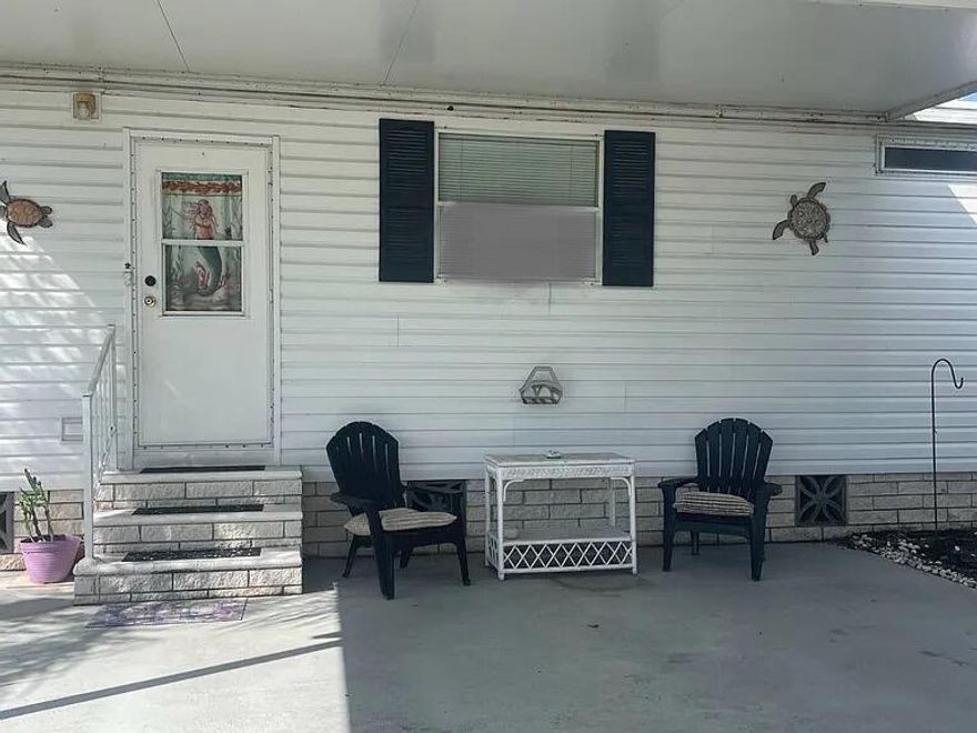 This home sits on a quiet street in Pinelake Gardens and Estates, a 55+ Community located 5 miles from Hobe Sound Beach. Amenities include two clubhouses, each offering a pool & hot tub, as well as  gym, library, shuffleboard, pickleball & tennis court. No assessments or real estates taxes. Trash & lawn service included in lease and you can have two pets! The  living room/dining space is perfect for entertaining leading to the private lanai. The roof has plenty of life left and has been well maintained.  AC has transferrable warranty for 7 yrs. The master bedroom is en-suite and has great closets! The guest room has a private bath across the hall.  The wide driveway can easily fit 4 cars. This place is ready to be turned into your cozy beach cottage!