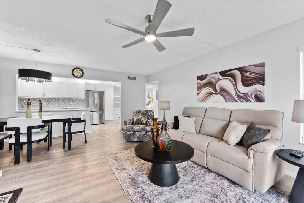 Photo of 722 SUNNY PINE Way #F1, Greenacres, FL 33415 (MLS # B26080455)