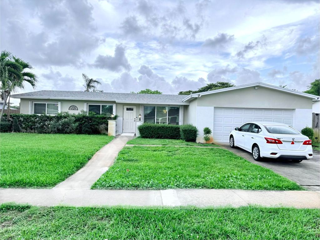 Photo of 10900 NW 18th Place, Pembroke Pines, FL 33026 (MLS # B26012212)