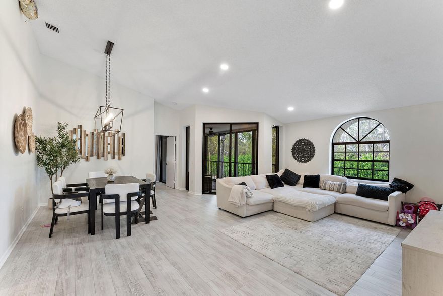 Welcome home to Platina, this resort style condo living has it all.  Centrally located in the heart of Boynton Beach with 24 hour man gated for added protection. Walk in to your condo with your functioning elevator to help you up the stairs. Vaulted ceilings as you enter the living area give this condo great extra natural light. Light and bright featuring 3 bedrooms and two bathrooms.  Kitchen has been opened up and updated with beautiful backsplash, quartz countertops and 42 inch white shaker cabinets. New Luxury Vinyl Flooring on the stairs and throughout. Oversized master offers walk in closet with built in shelves , dual sinks, separate tub with walk in shower.  Washer and Dryer inside, Large screened/glassed in patio. Deeded parking and more.