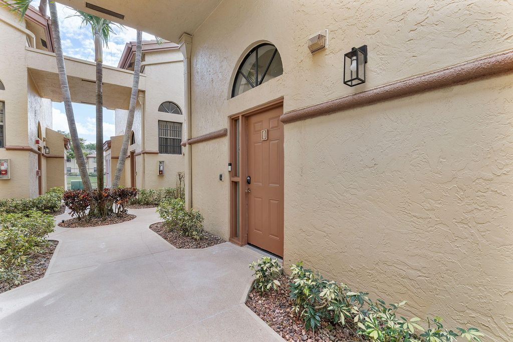 Photo of 5139 Europa Drive #O, Boynton Beach, FL 33437 (MLS # R11169604)