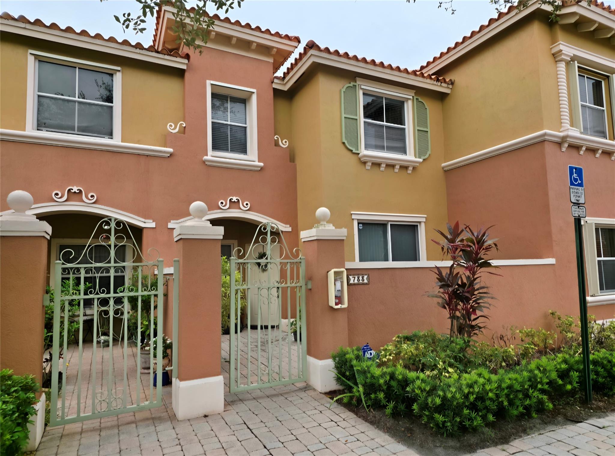 Welcome to this beautiful Mediterranean-style townhome in the heart of Pembroke Pines, close "A" Rated schools, Publix, Fitness Gyms, Shops, and a restaurants. This home boosts high ceilings knock down textured walls, separate living & dining room , & family room . Kitchen has lots of cabinets ,washer & dryer , back and front patios .The master suite includes a walk-in closet and an en-suite bathroom with a shower. AC unit is 2 years old & HOA maintains roof. Two assigned parking spaces directly in front of the unit, along with plenty of guest parking. Gated community with 24/7 security, amenities including a community pool. Ideally located near shopping, malls, and major highways.
