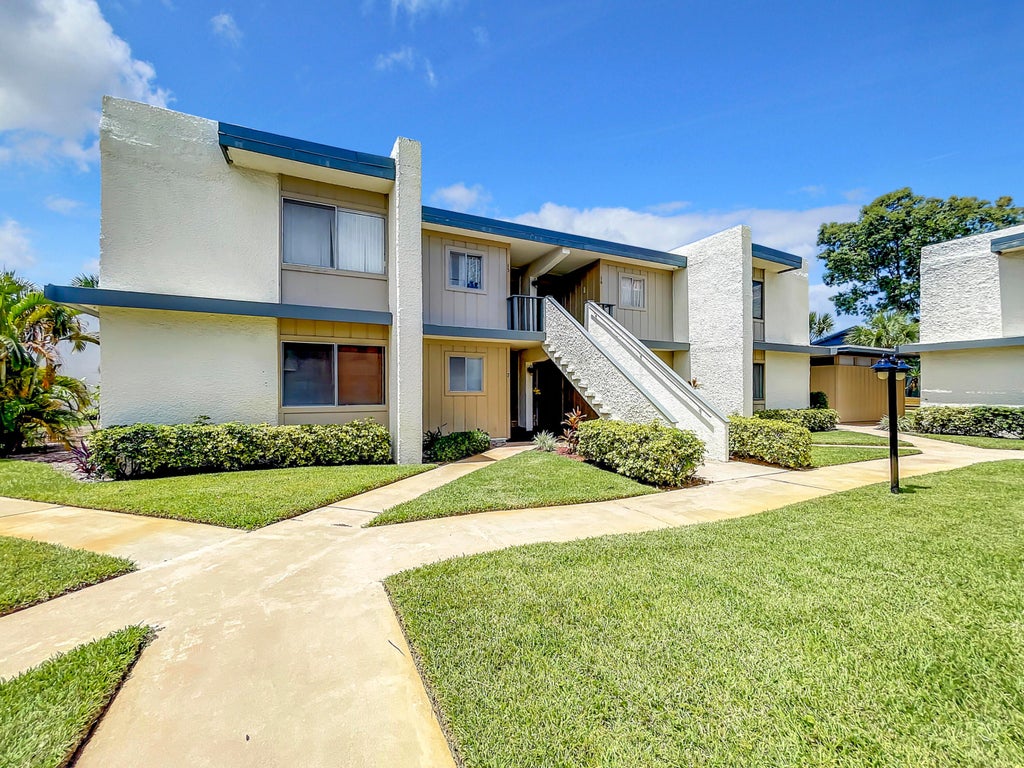 Photo of 1551 NE 13th Terrace #A16, Jensen Beach, FL 34957 (MLS # B26056764)