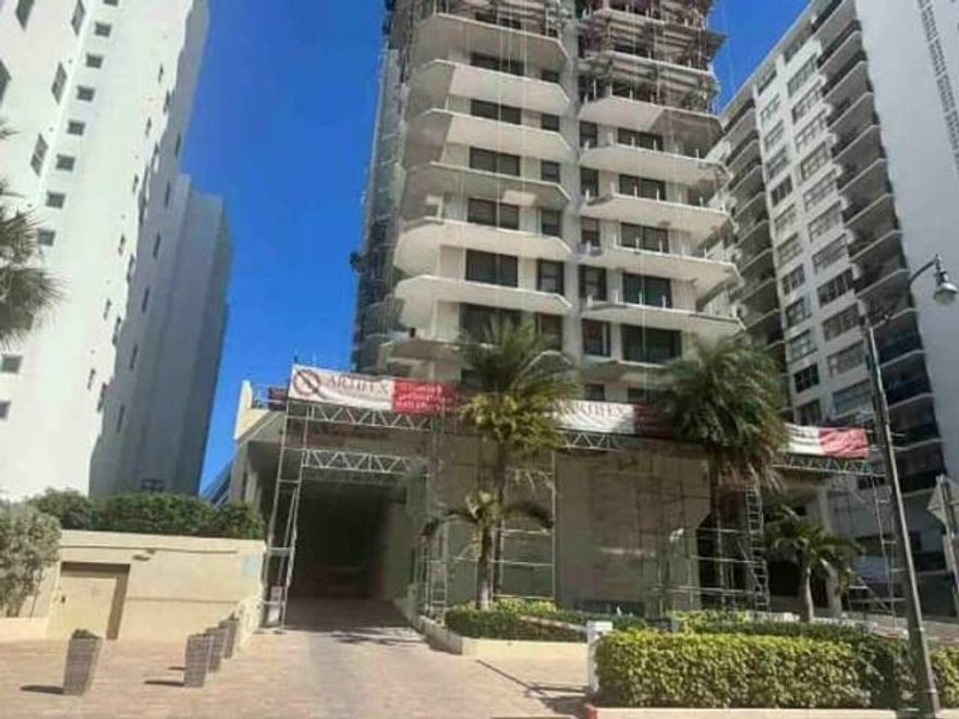 AUCTION. This affordable condo unit offers ample living space with 2 beds, 2 baths, living room, a den/office, a dining area, and a large kitchen with ample storage. Enjoy ocean views from the attached balcony. Here's your perfect opportunity for a first home. Assigned parking is available, and the secured complex offers ocean views, with direct ocean access and boardwalk, and other great amenities. Don't miss your opportunity. Repairs and updates will be needed. Unit is sold as-is. Buyer must review all HOA requirements and special assessment information with the HOA.