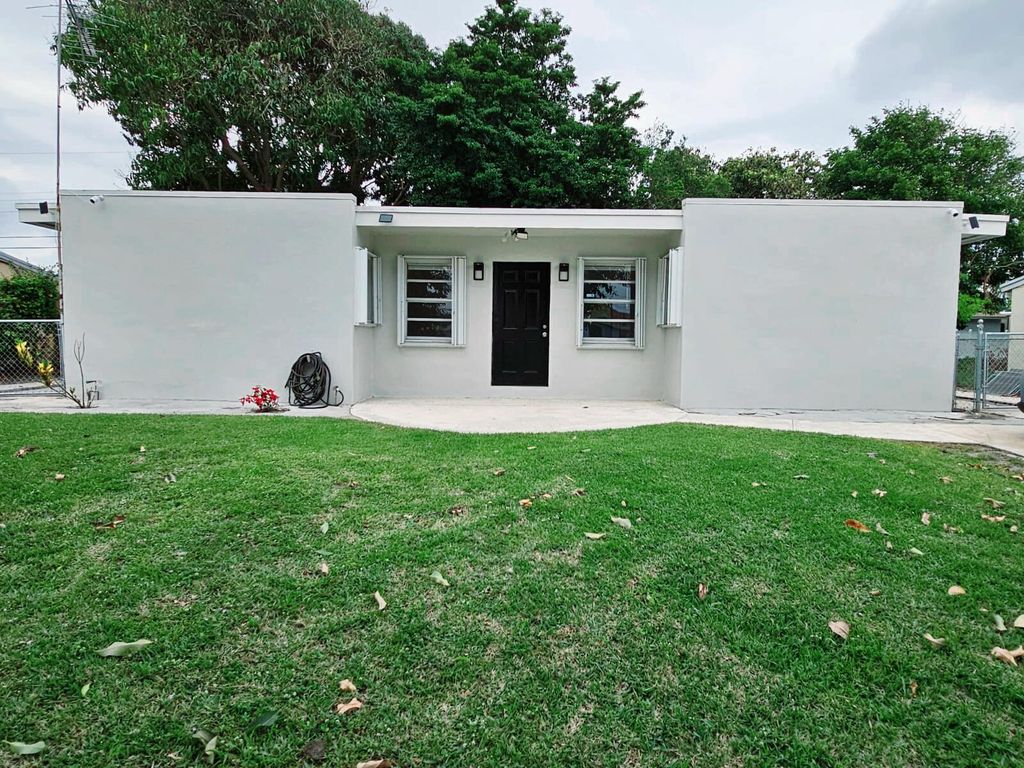 Photo of 427 Pensacola Drive, Lake Worth, FL 33462 (MLS # R10969483)