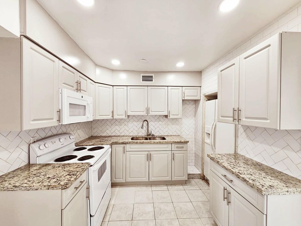 Photo of 427 Pensacola Drive, Lake Worth, FL 33462 (MLS # R10969483)