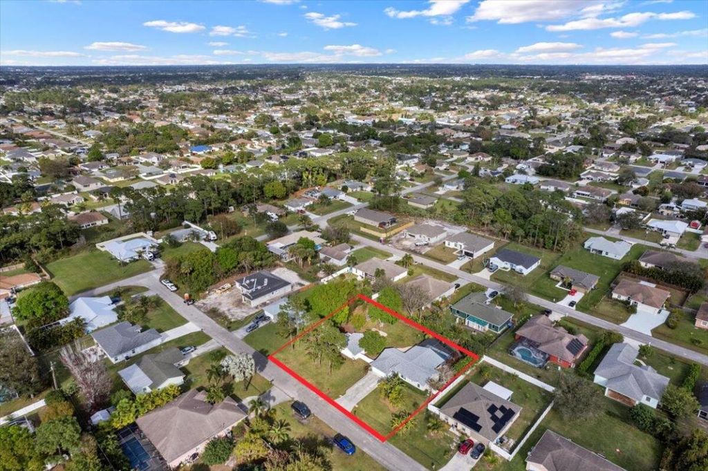 Photo of 3541 SW Dellamano Street, Port Saint Lucie, FL 34953 (MLS # R10958482)