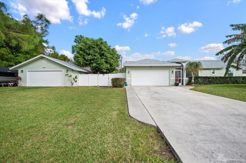 Photo of 3541 SW Dellamano Street, Port Saint Lucie, FL 34953 (MLS # R10958482)