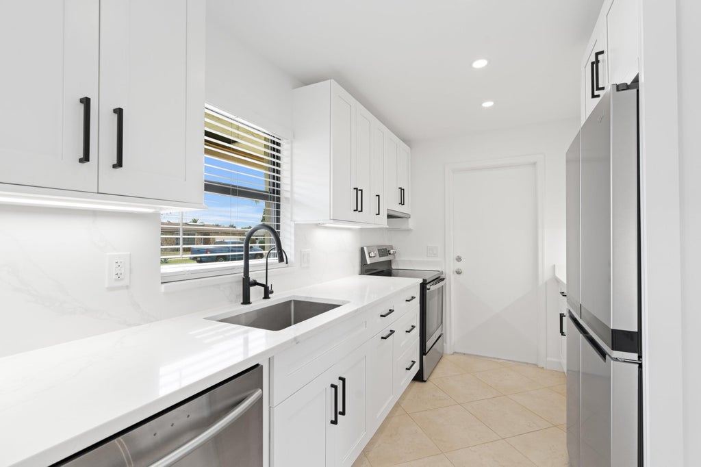 Photo of 14781 Summersong Lane, Delray Beach, FL 33484 (MLS # R11076591)