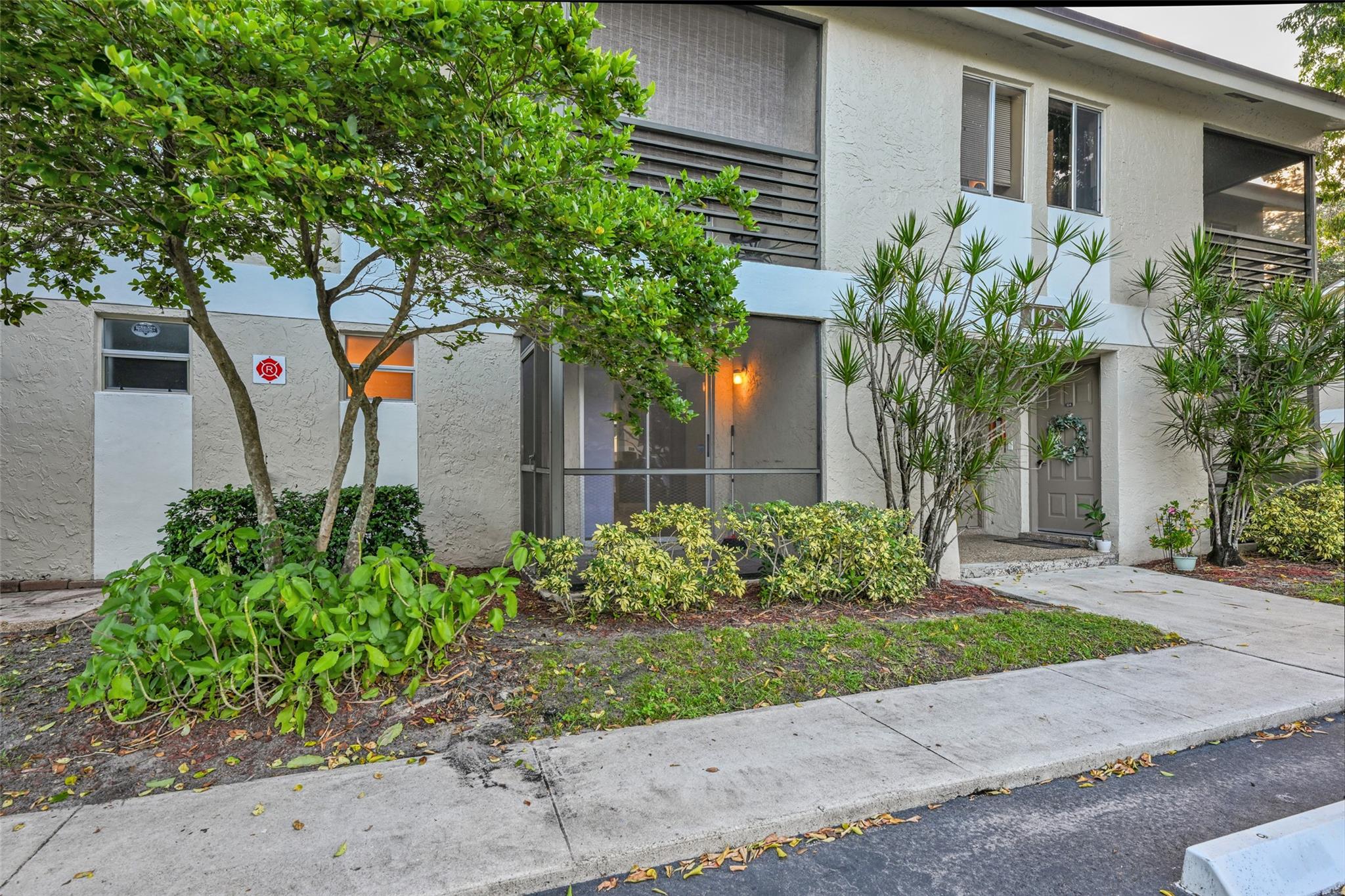 Beautiful and clean ground floor 1 bedroom 1 bath updated kitchen brand new fridge and microwave. Washer and dryer in unit. Newer AC & Hot water heater. Tile Floors Peaceful Canal & Garden view. Tons of storage Parking right in front of front door. Quiet complex with great amenities, Pool, gym, pickaball courts, walking path, bbq grills .  Great place to live come take a look.