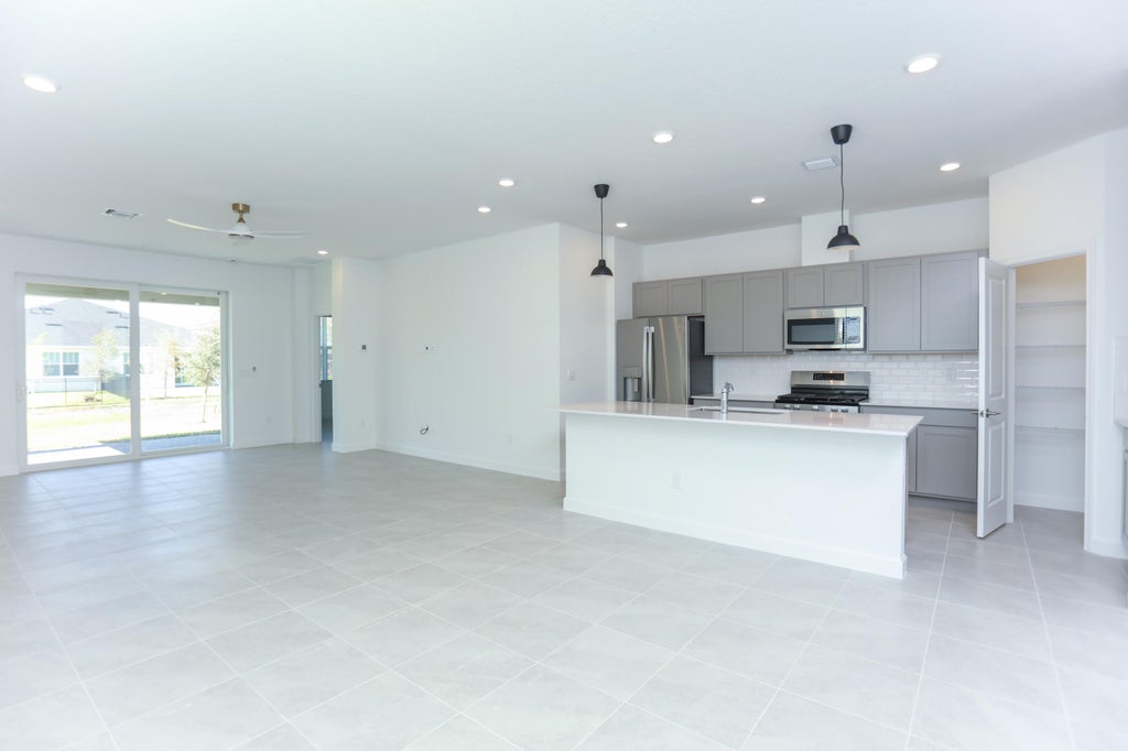 Photo of 1423 Tangled Orchard Trace, The Acreage, FL 33470 (MLS # B26014974)