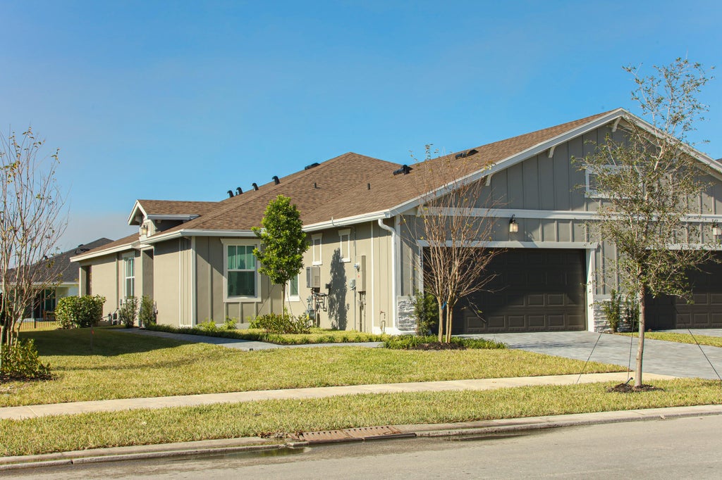 Photo of 1423 Tangled Orchard Trace, The Acreage, FL 33470 (MLS # B26014974)