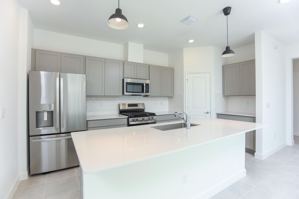 Photo of 1423 Tangled Orchard Trace, The Acreage, FL 33470 (MLS # B26014974)