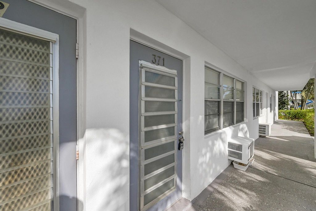 Photo of 371 Durham L Circle #371, Deerfield Beach, FL 33442 (MLS # R11148389)