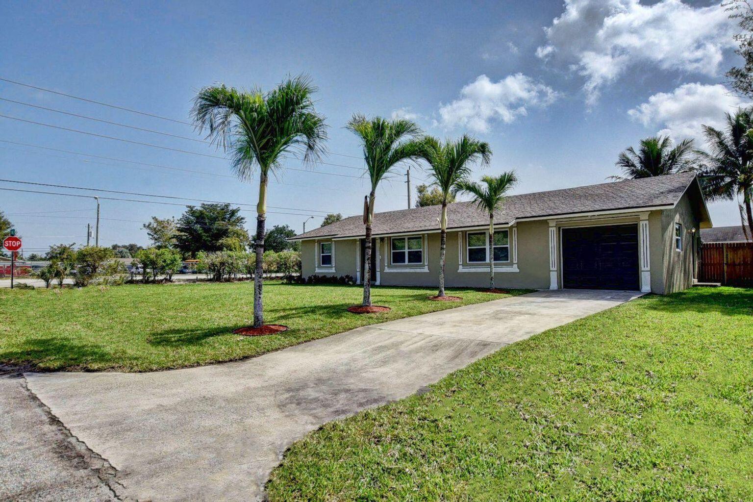 Listed below market value with closing cost credit of $10k.Completely redone! 3 bedrooms, 2 full bath, extra large 1 car garage with HUGE yard and NO HOA fees. Kitchen boast Quartz counter tops and Quartz back splash, Brand new appliances, Soft close cabinets. Split bedroom plan, crown molding. Brand new a/c, hot water heater, garage door & automatic opener. Tile in all living areas, high end laminate flooring in bedrooms, plenty of closet space. Plenty of Room for a pool. Entire yard is fenced. This home has everything you have dreamed of and more! Centrally located to everything, schools, shops, restaurants & I-95.Currenbtly rented to long time tenants at $3000 a month.