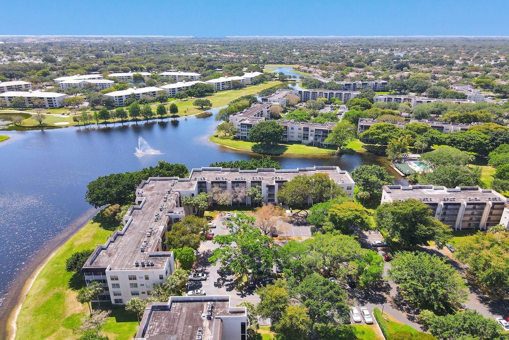 Photo of 9430 Poinciana Pl #415, Davie, FL 33324 (MLS # F10543421)