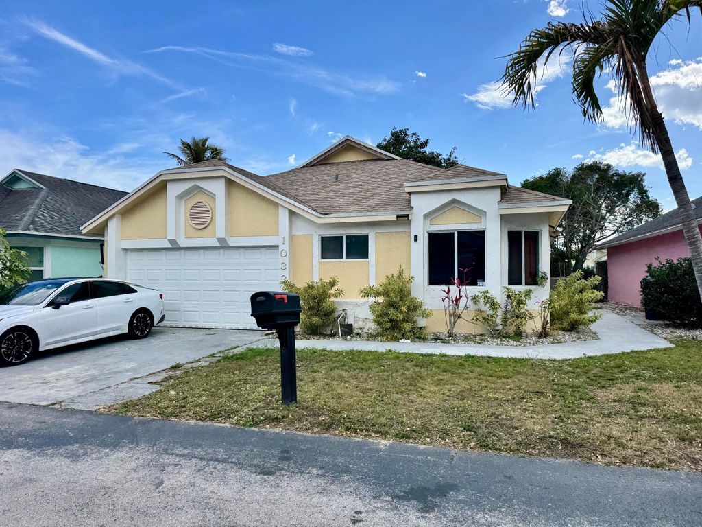 Photo of 1033 W Jasmine Lane, North Lauderdale, FL 33068 (MLS # R11168423)