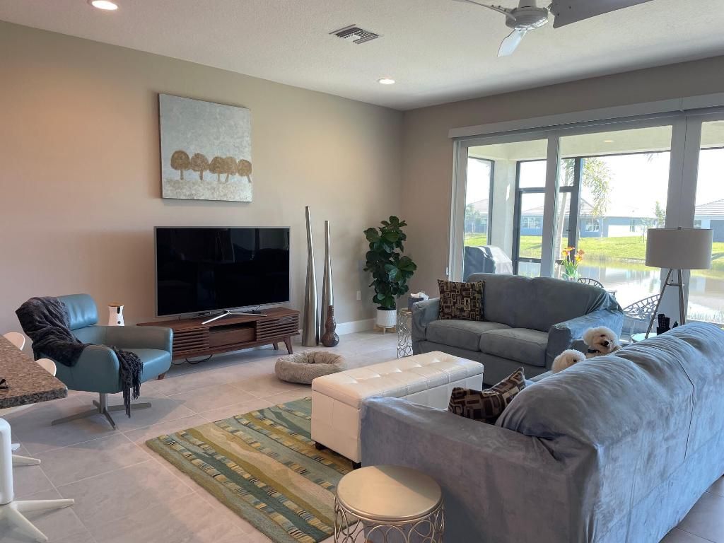Photo of 11849 SW Oceanus Boulevard, Port Saint Lucie, FL 34987 (MLS # R10934716)