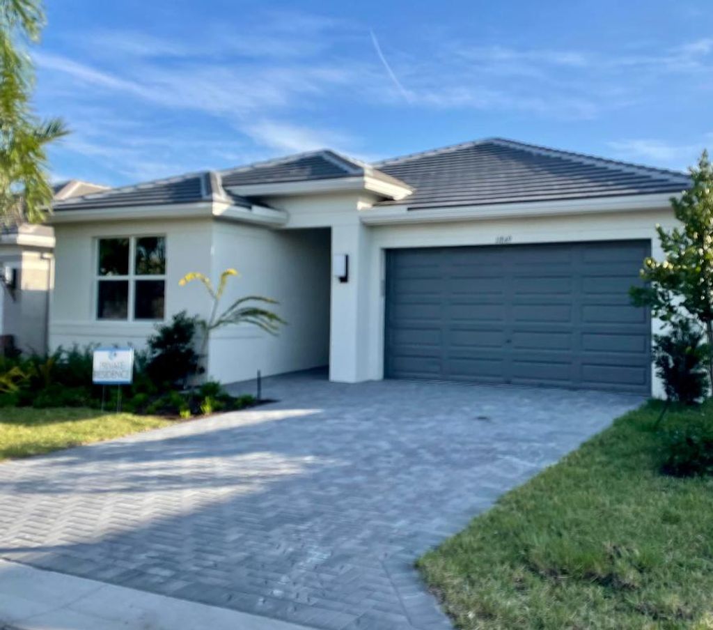 Photo of 11849 SW Oceanus Boulevard, Port Saint Lucie, FL 34987 (MLS # R10934716)
