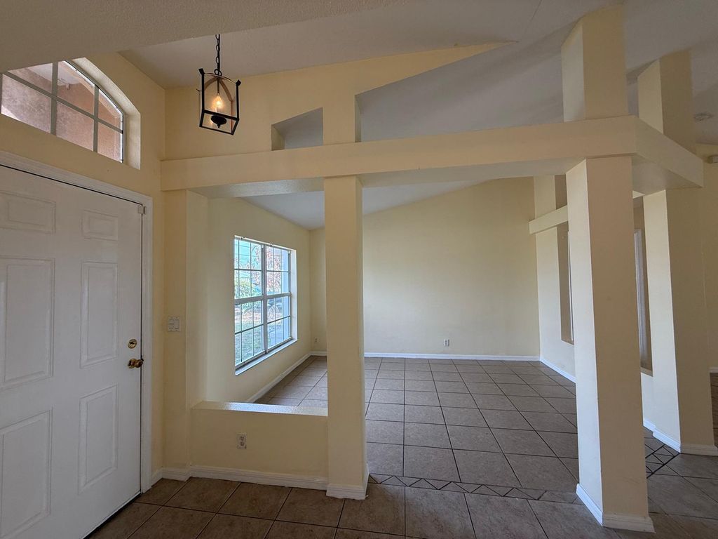 Photo of 974 SW California Boulevard, Port Saint Lucie, FL 34953 (MLS # B26007407)