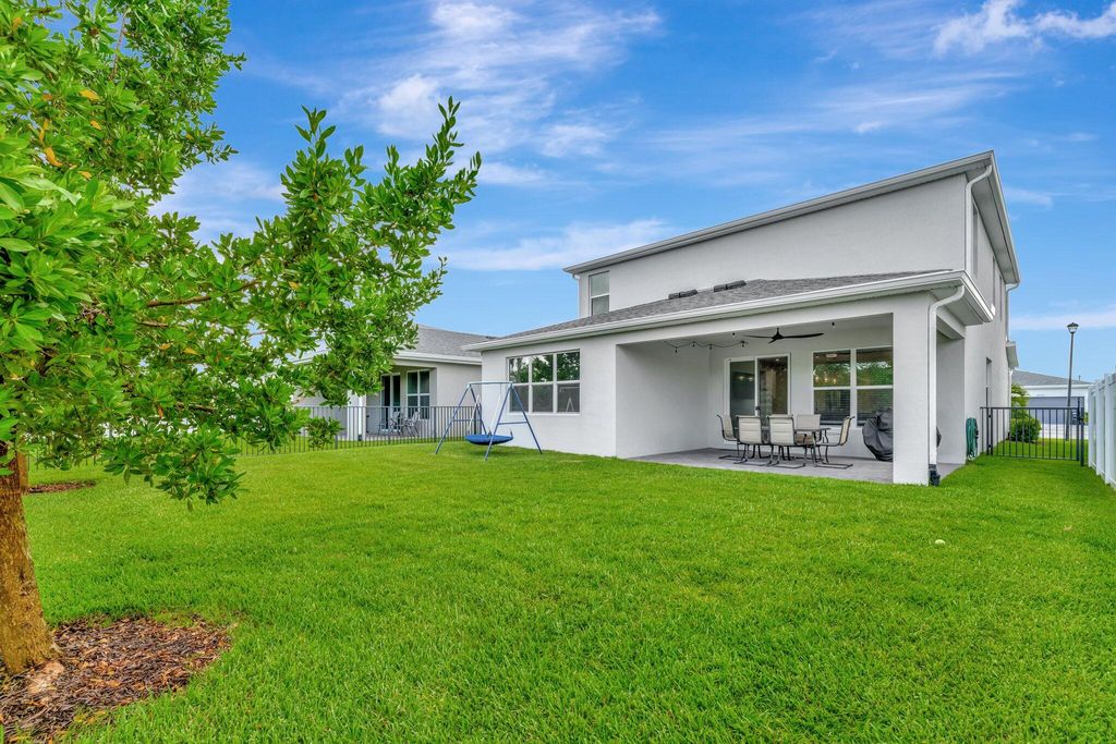 Photo of 10721 SW Estella Lane, Port Saint Lucie, FL 34953 (MLS # R11152628)