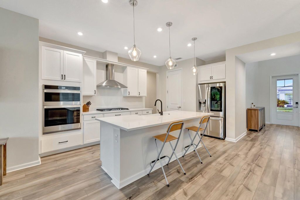 Photo of 10721 SW Estella Lane, Port Saint Lucie, FL 34953 (MLS # R11152628)