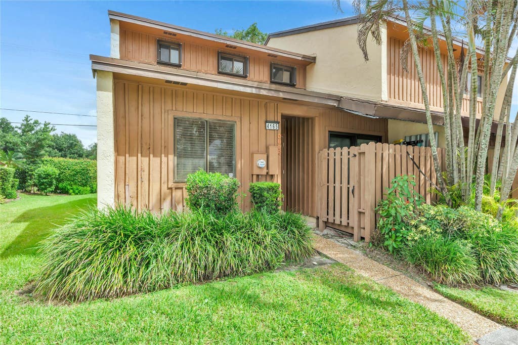 Photo of 4165 S PINE ISLAND Road #4165, Davie, FL 33328 (MLS # B26066573)