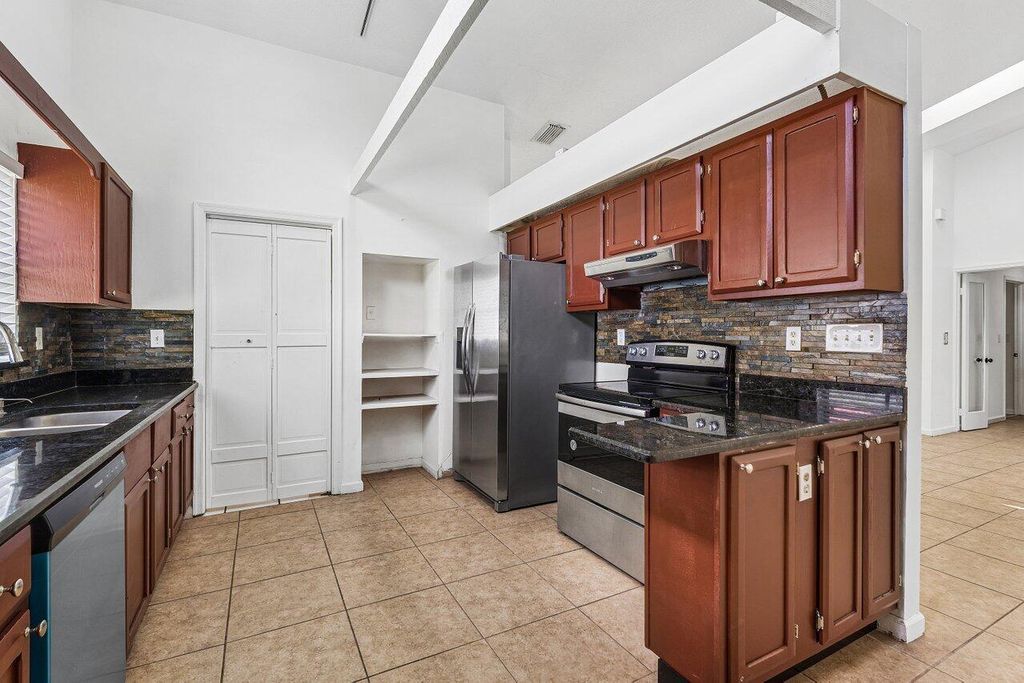 Photo of 14616 Autumn Avenue, Wellington, FL 33414 (MLS # B26031212)