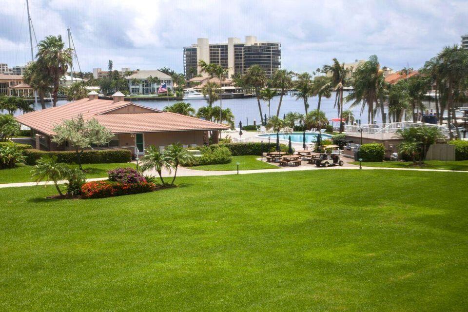 Stunning Waterfront Condo with Private Marina ! Experience coastal living at it's finest in this beautifully renovated 2 bedroom, 2 bath condo located in the heart of East Delray. Nestled along the Intracoastal, this light filled residence offers direct water views and access to a private marina ~a rare find for boating enthusiasts! Step inside to an open concept layout featuring chef inspired kitchen with bar area. The living and dining areas flow seamlessly to screened balcony overlooking pool and marina area~ perfect for morning coffee or sunset cocktails. The primary suite offers large walk in closet and renovated en suite bath. The second bedroom is also en suite and is ideal for guests or home office. Community features include...see MORE for additional remarks