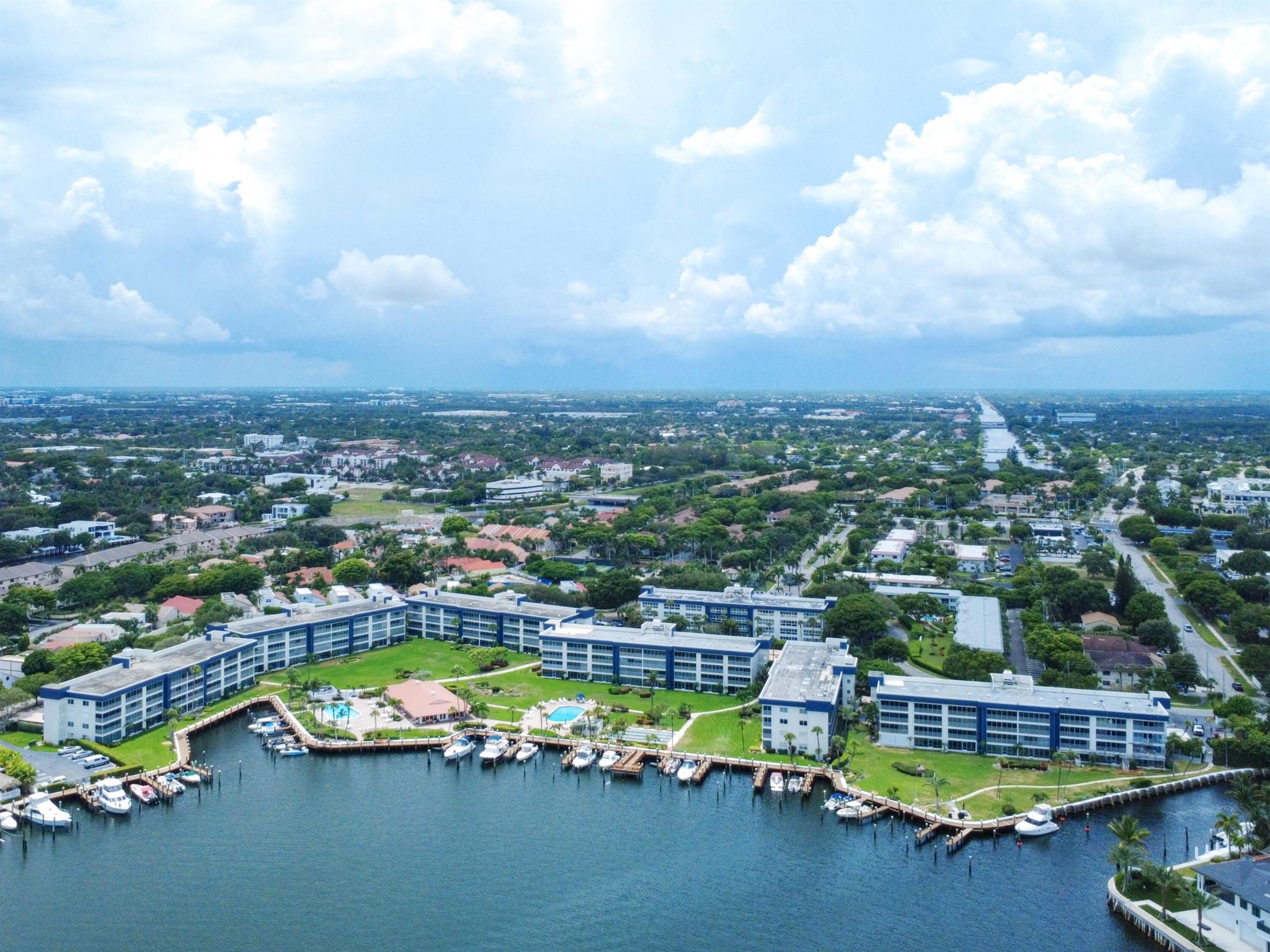Stunning Waterfront Condo with Private Marina ! Experience coastal living at it's finest in this beautifully renovated 2 bedroom, 2 bath condo located in the heart of East Delray. Nestled along the Intracoastal, this light filled residence offers direct water views and access to a private marina ~a rare find for boating enthusiasts! Step inside to an open concept layout featuring chef inspired kitchen with bar area. The living and dining areas flow seamlessly to screened balcony overlooking pool and marina area~ perfect for morning coffee or sunset cocktails. The primary suite offers large walk in closet and renovated en suite bath. The second bedroom is also en suite and is ideal for guests or home office. Community features include...see MORE for additional remarks