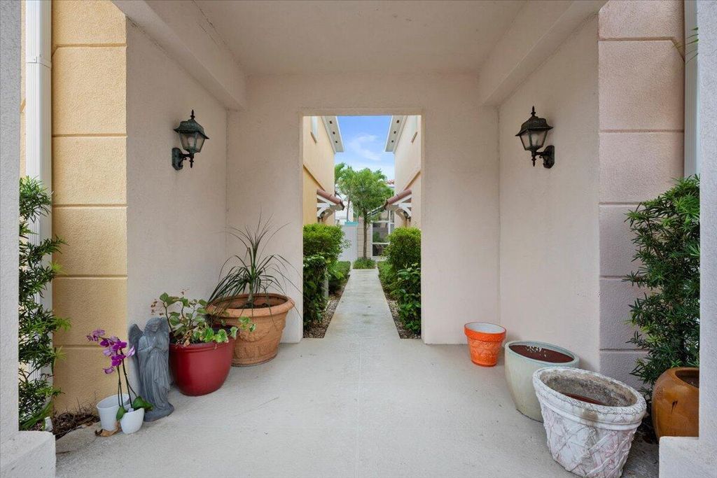 Photo of 11 Live Oak Circle #11, Tequesta, FL 33469 (MLS # R11103342)