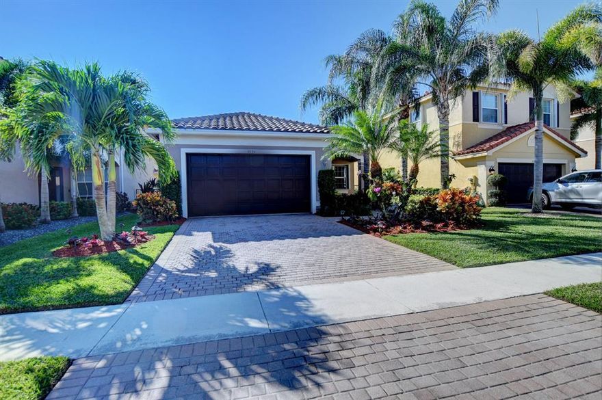 Rarely available 3 bedroom / 2 bathroom, 1 story home located in Canyon Trails.  This fabulous open layout is designed for entertaining.  The beautiful kitchen features granite countertops, stainless steel appliances, under the counter lighting, 42'' cabinets with a Breakfast bar that opens up to the great room.  The living area is tiled throughout, hi hat lighting with a formal dining room, that leads to the fenced &  well manicured backyard.  The Master Bedroom has his & hers closets, a soaking tub, a walk- in shower and dual sinks.  Enjoy a glass of wine on the patio overlooking the private yard. Canyon Trails is pet friendly, guard gated ,A' rated schools, close to  shopping, dining, entertainment, highways & airports. The city is building Canyon District Park across the street. Canyon Trails offers a magnificent Clubhouse, Indoor Sports Complex with Basketball, Volleyball & Table Tennis, Arcade Center, Splash & Play Water Park with Wading Pool and Spray Stations, Fitness Center and Aerobics Room, Just For Kids Activity Center, Resort Style Pool, Party Pavilion, Outdoor Kids Tot Lot, & Outdoor Basketball.