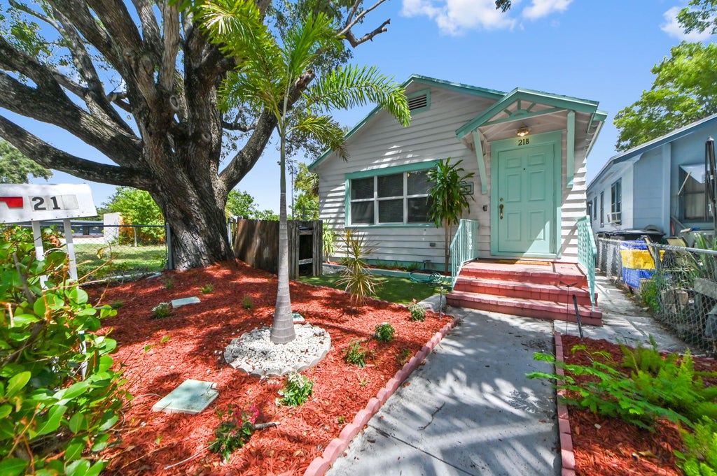 Photo of 218 N H Street, Lake Worth Beach, FL 33460 (MLS # B26077998)