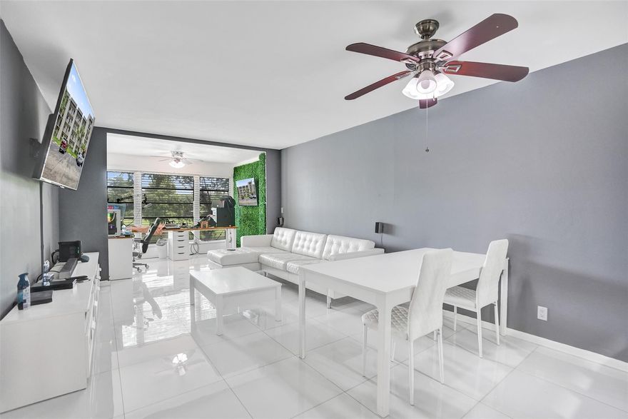 Beautifully updated 2nd-floor condo offering 1 bedroom, 1.5 baths, and a den with relaxing lake views. This home features new tile flooring, modern appliances, 2023 A/C, 2025 water heater, and 2025 electrical panel. Laundry is conveniently located on the same floor, and the pool is just steps away. Pine Island Ridge is an all-ages, pet-friendly community with a private country club. Amenities include restaurants, pools, fitness center, golf, tennis, basketball, meeting rooms, and a kid’s park. Assigned parking plus plenty of guest spots available. 

Prime central Broward location near I-595, NSU, and Broward College. Association: $535.88/month + $65.76 special assessment until April 2042. Association requires 10% down, 650+ FICO, no rentals.