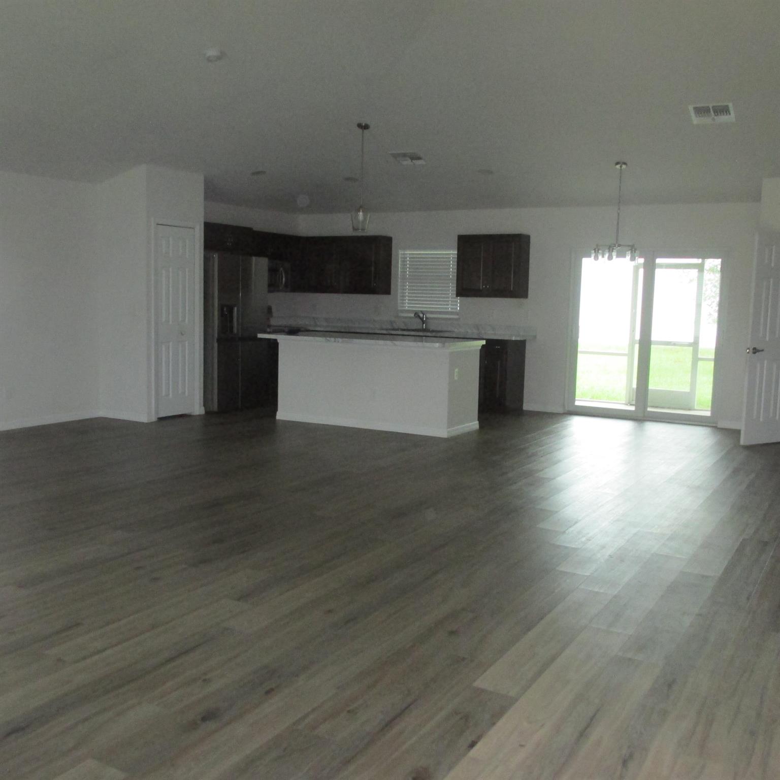 Wonderful newer home in an even better neighborhood. Located in the Sandpiper area with quick access to PSL Blvd. and US 1. This open floor plan home has LVP flooring in social rooms and carpeted bedrooms. Home comes equipped with impact windows and all appliances. Available now with just first and security deposit for move in.