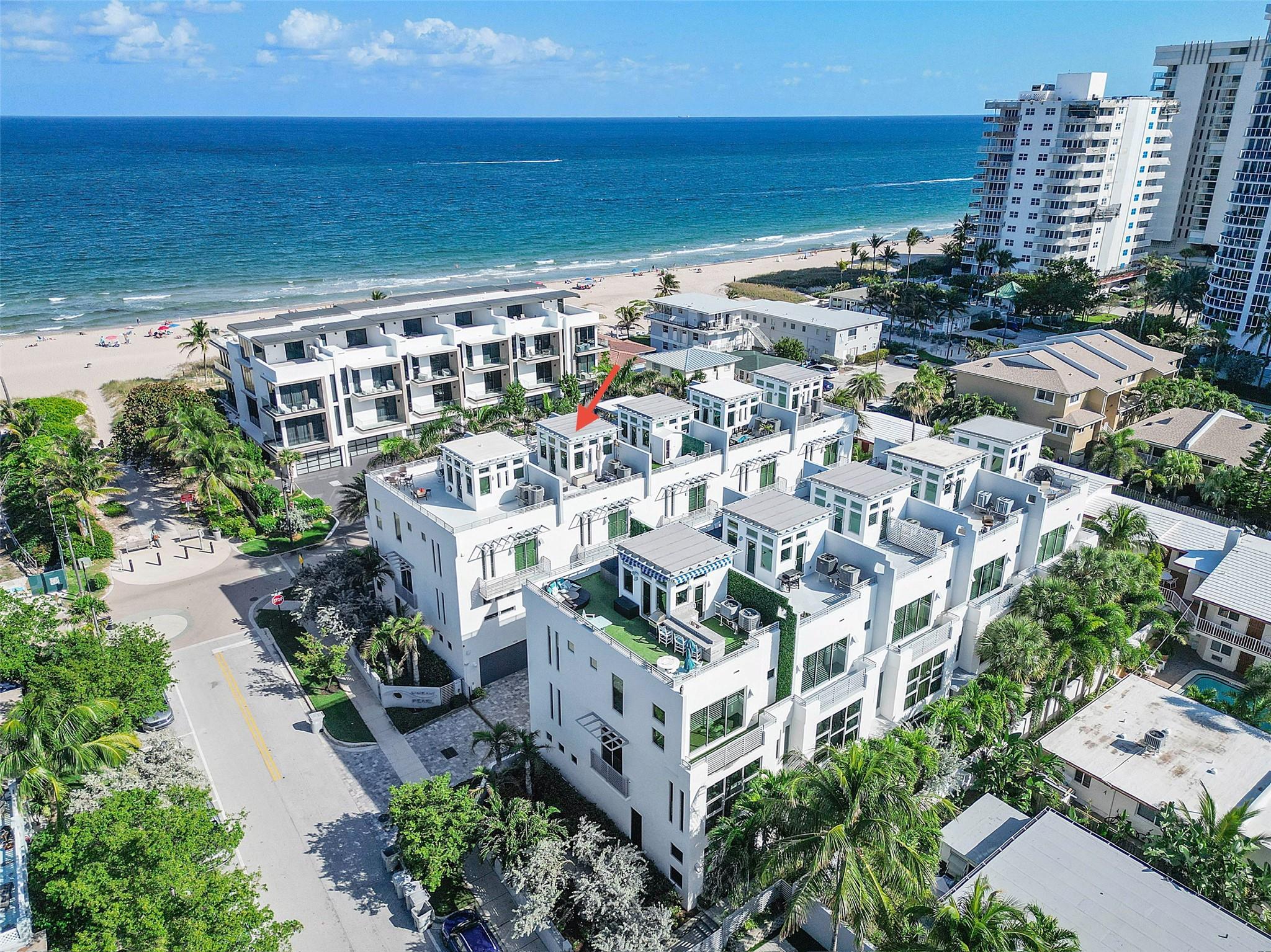 Stunning Beach Townhouse with Private Oceanview Rooftop + turnkey option! Just steps from the sand on a charming, quiet street in booming Pompano Beach, this home offers an unbeatable location with $7+ million dollar townhomes across the street & luxury buildings such as the Ritz, Waldorf, & W all under development. BBQ & entertain on your own oceanview rooftop, offering breathtaking sunrises/sunsets, & rooftop bar! With 2,835 sq ft of impeccably maintained living space, there are 3 spacious BRs, 3.5 baths, & elevator. Roof recently sealed w/ durable 20-year epoxy for long-lasting peace of mind. Huge 2-car garage. Can be fully furnished for additional cost. Luxury beach living without huge fees. Heated pool+gym. Variety of shopping, dining, & pier activities, all within walking distance.