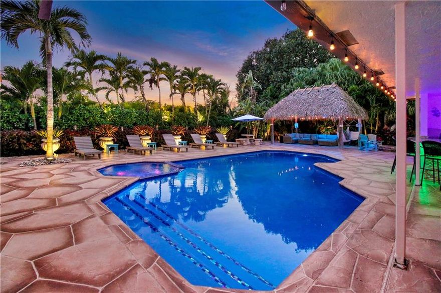 Absolutely stunning ! Hands down the nicest home on the rental market! If you want to live the MTV CRIBS lifestyle then you've come to the right place. This home has completely been renovated with nearly $500,000 of upgrades. The home features soaring high 23' ceilings and has it's own movie theatre, basketball court, kids synthetic grass playground and a tropical paradise pool area that instantly makes you feel like you're living in a resort. Saltwater heated pool, two tiki huts, all custom colorful LED lighting throughout, outdoor kitchen, custom stone walls and fireplace, smooth coated ceilings, IMPACT WINDOWS throughout, two driveways, fully fenced in backyard and SO MUCH MORE. Home can be rented with or without furniture.