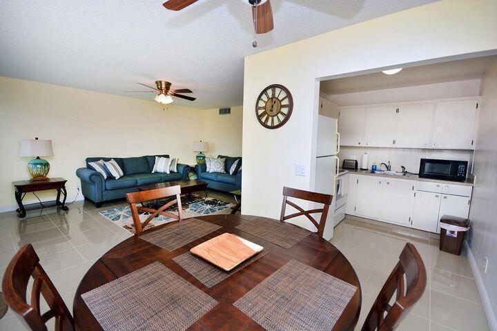 Welcome to your Florida dream retreat! This beautifully updated and fully furnished condo is move-in ready and truly turnkey--just bring your toothbrush! Featuring gleaming porcelain floors and tasteful finishes throughout, this immaculate 2-bedroom, 1.5-bath home offers walk-in closets, a peaceful garden-view patio, and plenty of natural light. Located in the vibrant 55+ community of Regal Palm, you'll enjoy resort-style living just 15 minutes from PBI Airport and moments from top hospitals, highways, shopping, dining, and world-famous beaches.