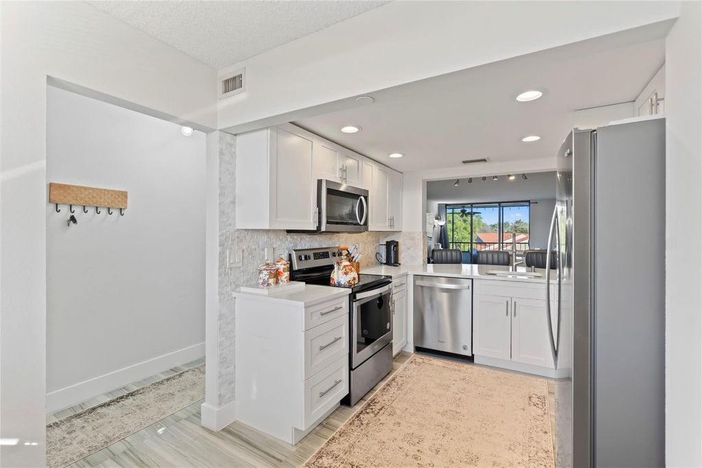 Photo of 1850 Homewood Boulevard #512, Delray Beach, FL 33445 (MLS # F10548511)