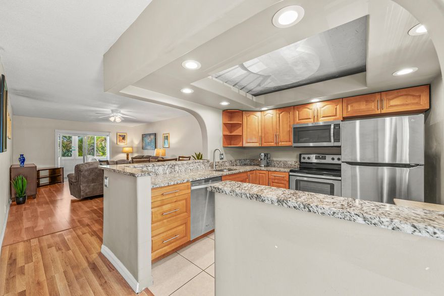 BEST VALUE IN VILLAGE ROYALE!  BRING YOUR FUSSIEST BUYER AND SHOW THIS BEAUTY!  Fully updated kitchen with cove ceiling and stainless appl.  High impact glass windows. Newer AC and HWH. Furniture negotiable. Updated baths w/granite counters. Very active community that is close to everything!