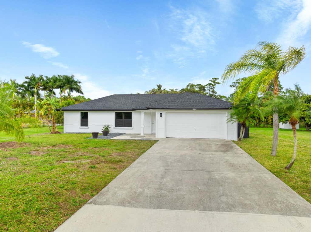 Photo of 18063 Hamlin Boulevard, The Acreage, FL 33470 (MLS # R11065792)